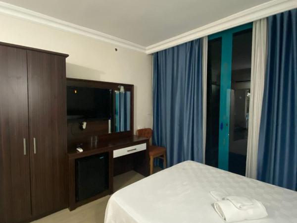 Theluna City Hotel : photo 1 de la chambre chambre double Économique