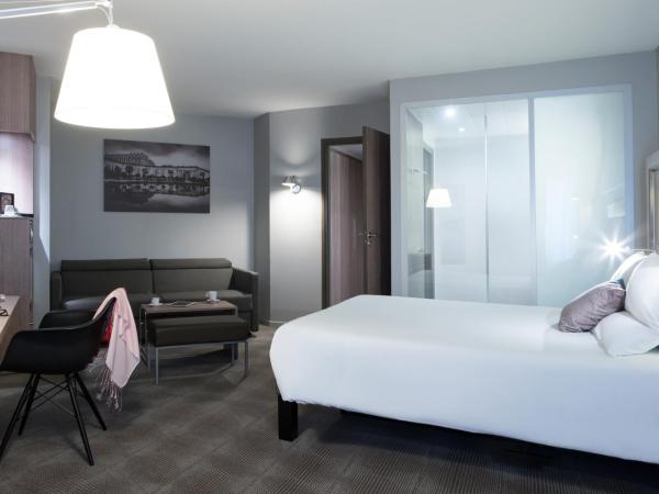 Novotel Château de Versailles : photo 1 de la chambre chambre lit queen-size exécutive avec canapé-lit