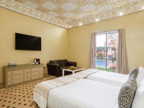 Riad Albakech boutique & spa : photo 2 de la chambre suite - vue sur piscine