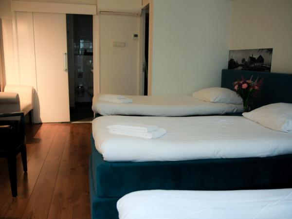 Hotel 55 - City Centre : photo 1 de la chambre chambre triple confort avec douche