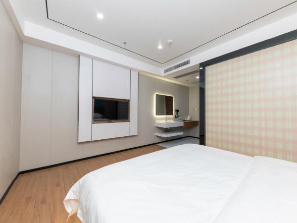 Guangzhou Haiyue Hotel : photo 1 de la chambre chambre affaires lit queen-size
