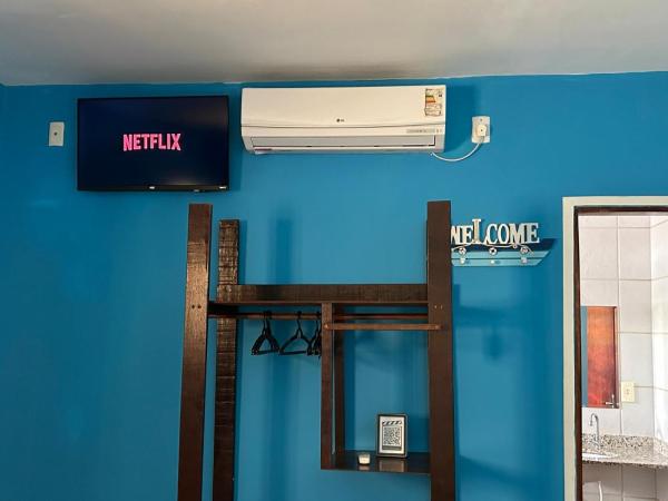 Pousada Jardim Magico : photo 1 de la chambre chambre quadruple avec salle de bains privative