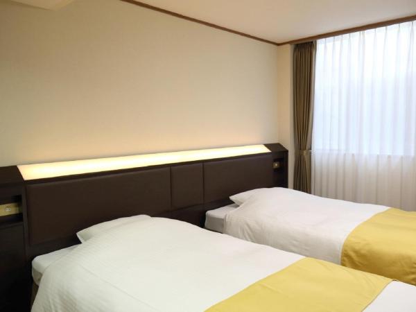 Hotel Awina Osaka : photo 6 de la chambre chambre lits jumeaux avec lit d'appoint - fumeurs