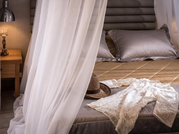 Omiros Boutique Hotel (Adults Only) : photo 8 de la chambre suite lit king-size classique
