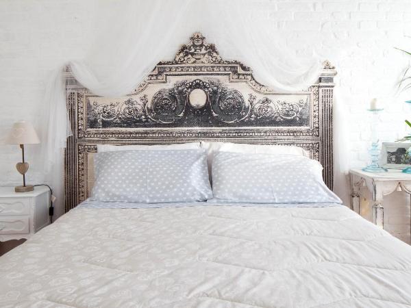 Bed & Breakfast Canova : photo 2 de la chambre chambre lit king-size - vue sur jardin