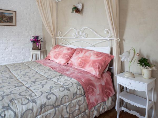 Bed & Breakfast Canova : photo 4 de la chambre chambre lit queen-size avec balcon