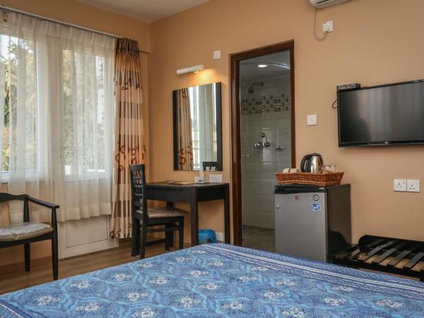 Nirvana Home : photo 10 de la chambre chambre lit king-size avec balcon