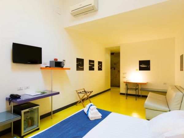 Correra 241 Lifestyle Hotel : photo 3 de la chambre chambre triple