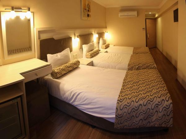 Grand Zeybek Hotel : photo 2 de la chambre chambre triple standard
