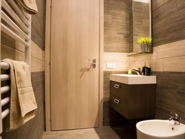 Romano Rooms : photo 2 de la chambre chambre triple avec salle de bains privative