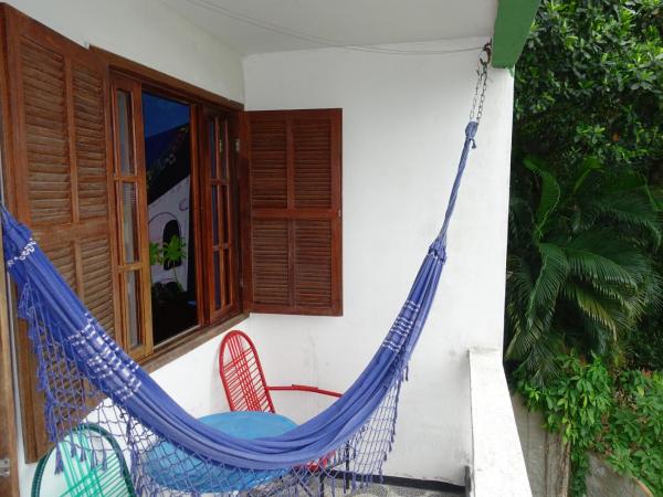 Pousada Favelinha : photo 9 de la chambre chambre lit queen-size avec balcon