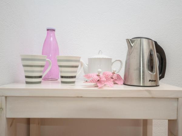 Panormos Hotel and Studios : photo 2 de la chambre chambre familiale deluxe - vue sur mer