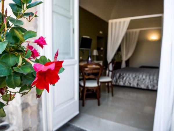 Albergo Del Sedile : photo 5 de la chambre suite lit queen-size avec baignoire spa