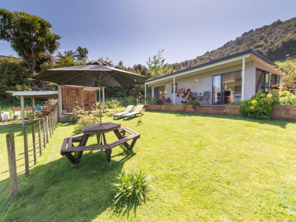 City Lights Boutique Lodge : photo 1 de la chambre cottage - vue sur jardin