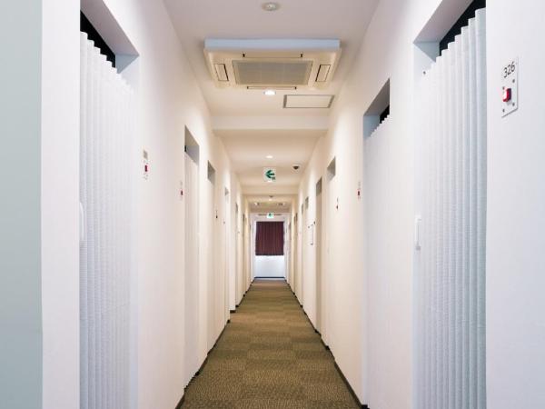 Capsule Hotel Cube Hiroshima : photo 3 de la chambre chambre de luxe avec douche et toilettes communes - réservée aux femmes