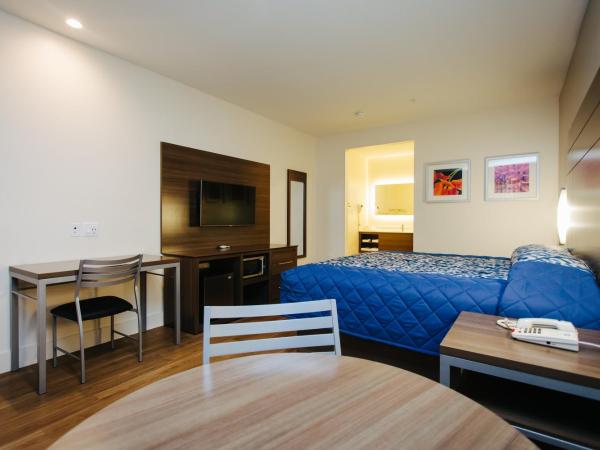 Palace Inn Blue City Centre : photo 1 de la chambre chambre lit king-size supérieure