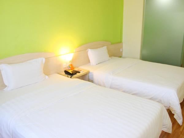 7Days Premium Guangzhou Kecun Subway Station : photo 2 de la chambre chambre lits jumeaux standard