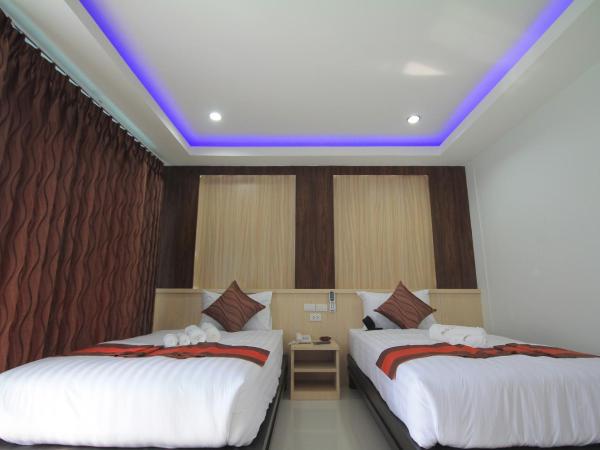 Lanta Fevrier Resort : photo 1 de la chambre chambre lits jumeaux - vue sur piscine