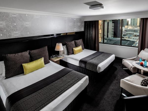 Pullman Brisbane King George Square : photo 1 de la chambre chambre triple exécutive