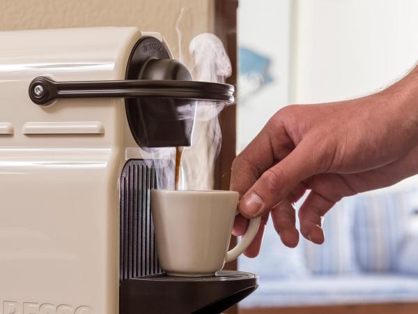 Cosmopolitan Suites - Small Luxury Hotels of the World : photo 4 de la chambre chambre double cosmo - vue sur volcan