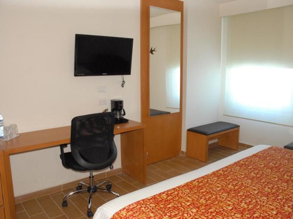 Aranzazu Centro Historico : photo 4 de la chambre chambre exécutive - 1 lit king-size