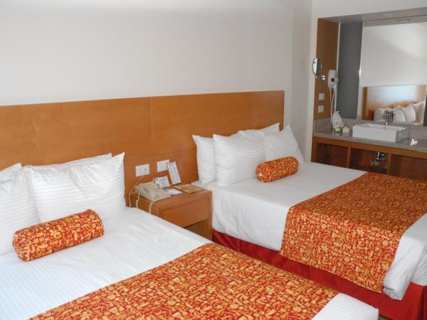 Aranzazu Centro Historico : photo 6 de la chambre chambre exécutive - 2 lits doubles