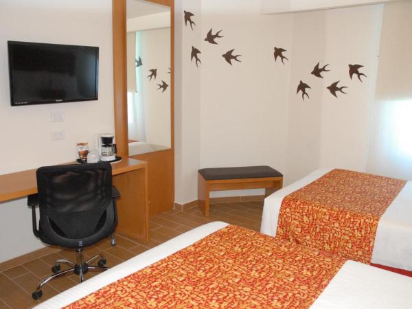 Aranzazu Centro Historico : photo 7 de la chambre chambre exécutive - 2 lits doubles