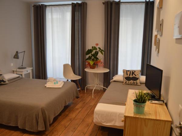 Hotel Smile & Co Hostal Boutique : photo 4 de la chambre chambre triple