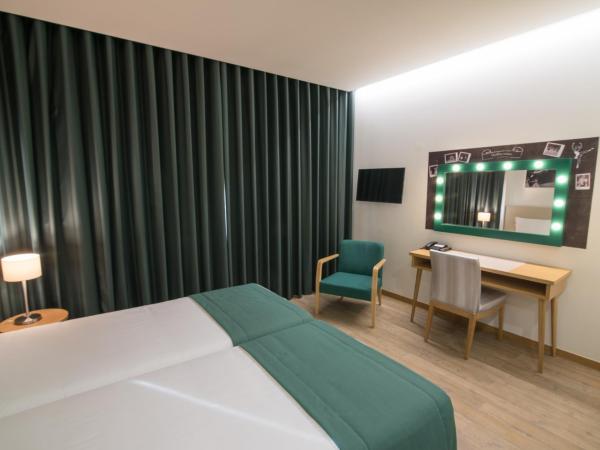 Porto Coliseum Hotel : photo 3 de la chambre chambre lits jumeaux de luxe