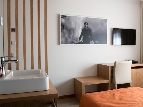 Porto Coliseum Hotel : photo 4 de la chambre chambre lits jumeaux standard