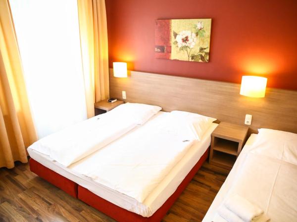 Hotel Marienthal Garni : photo 2 de la chambre chambre triple