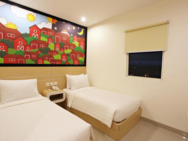 Nite & Day Surabaya - Gunungsari : photo 5 de la chambre chambre double ou lits jumeaux standard
