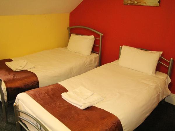 London Olympus Hotel Nirvana : photo 1 de la chambre chambre lits jumeaux
