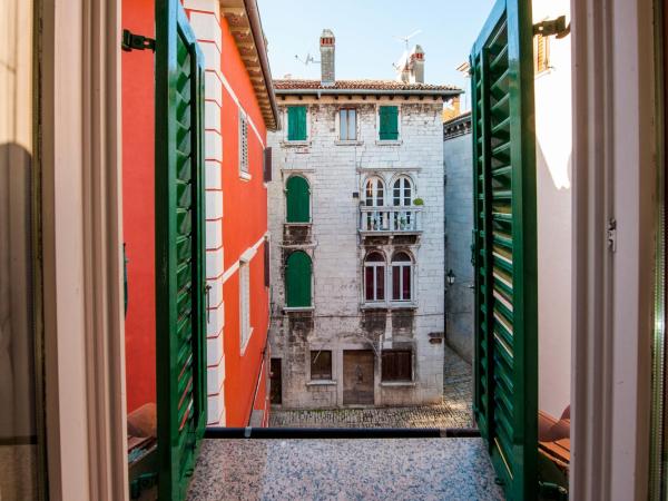 Residence MARCO POLO Centro Storico : photo 8 de la chambre attic double room with kitchenette