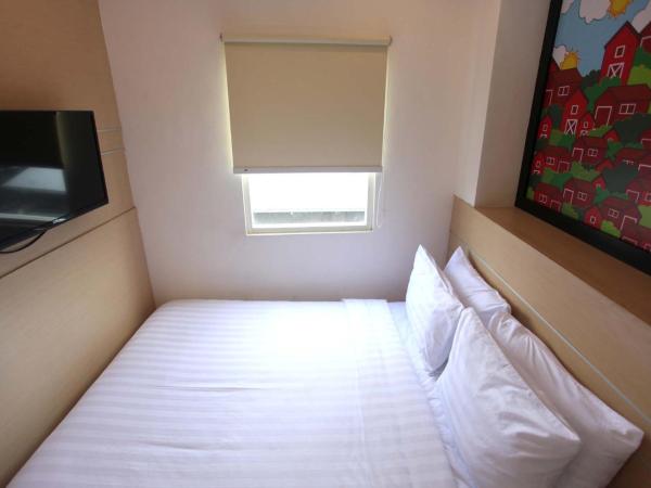 Nite & Day Surabaya - Gunungsari : photo 4 de la chambre chambre double