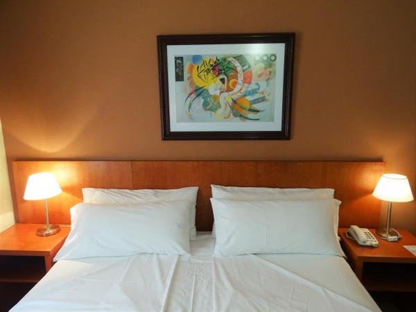 Hotel UTHGRA de las Luces : photo 4 de la chambre chambre double