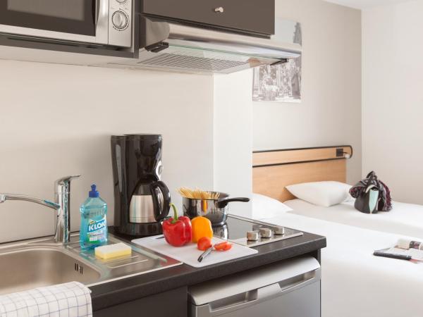 Aparthotel Adagio Access Dijon République : photo 4 de la chambre studio lits jumeaux