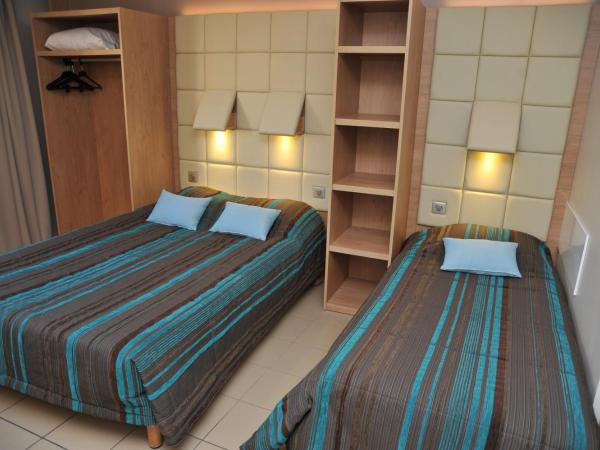 Hotel Espace Cite : photo 6 de la chambre chambre triple