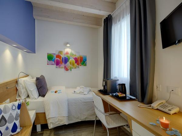 Hospitality Hotel : photo 4 de la chambre chambre simple