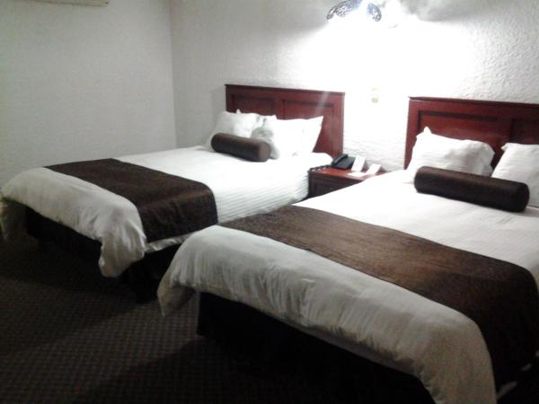 Howard Johnson by Wyndham Morelia Calle Real : photo 6 de la chambre chambre double avec 2 lits doubles - non-fumeurs