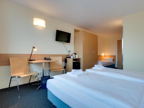 Familienhotel Citylight : photo 5 de la chambre chambre triple