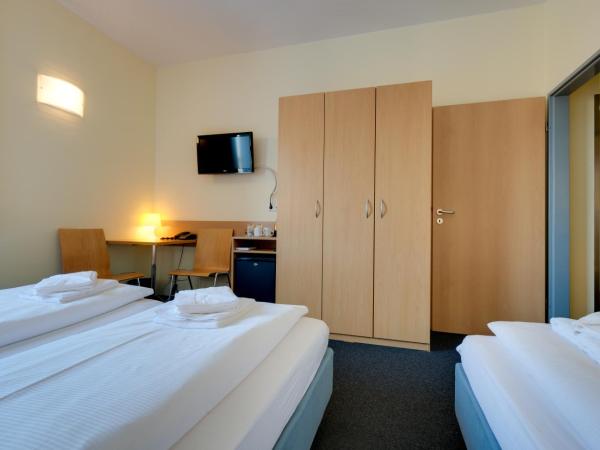 Familienhotel Citylight : photo 7 de la chambre chambre triple