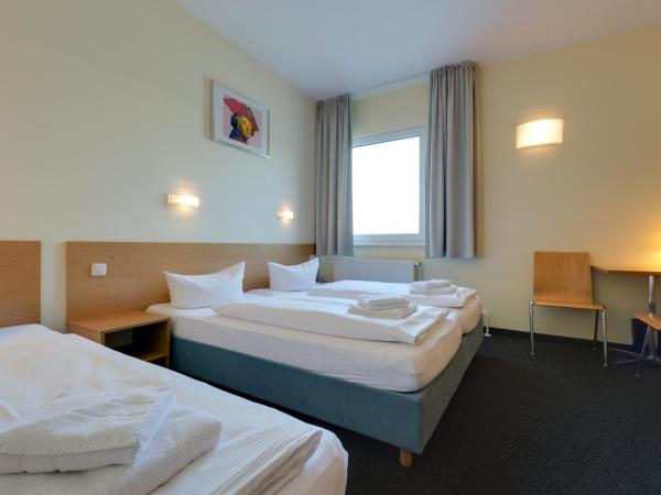 Familienhotel Citylight : photo 6 de la chambre chambre triple