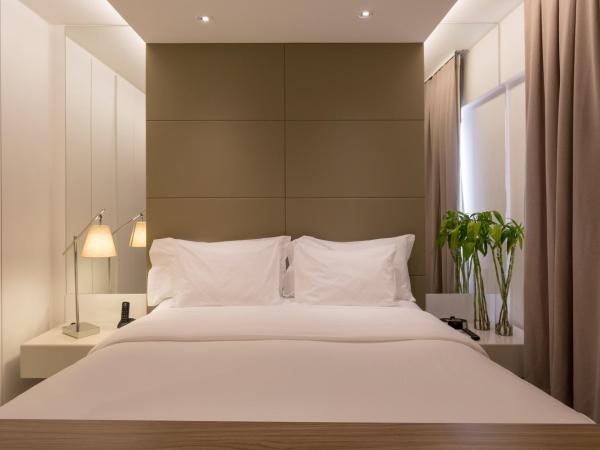 Hilton Garden Inn Belo Horizonte Lourdes : photo 2 de la chambre business class com cama king-size