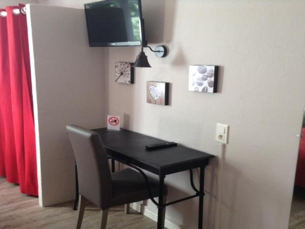 Hôtel le Chalet Fleuri : photo 3 de la chambre chambre lit queen-size