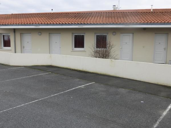 La Godinière : photo 3 de la chambre chambre triple avec 1 lit simple et 1 lit double