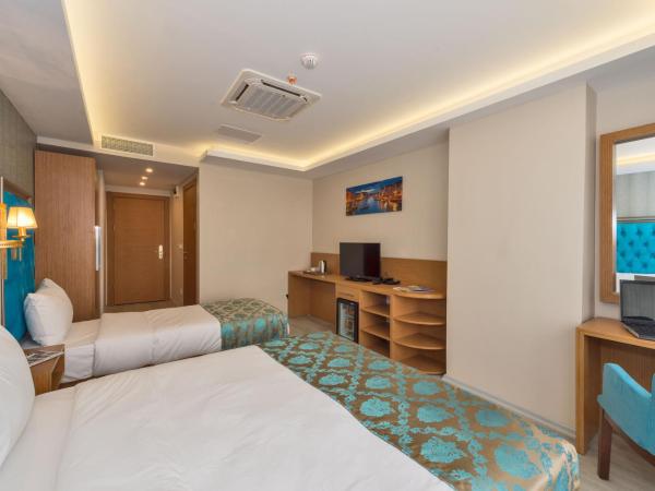 Grand Palace Hotel : photo 5 de la chambre chambre triple deluxe