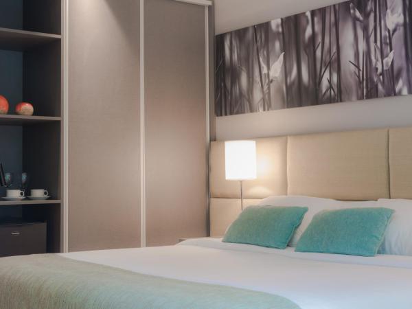 Portal Plaza Suites : photo 10 de la chambre chambre double exécutive