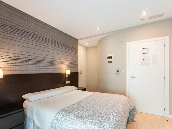 Pensión Altair : photo 4 de la chambre chambre double avec salle de bains privative