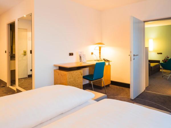 Hotel Am Terrassenufer : photo 1 de la chambre suite junior